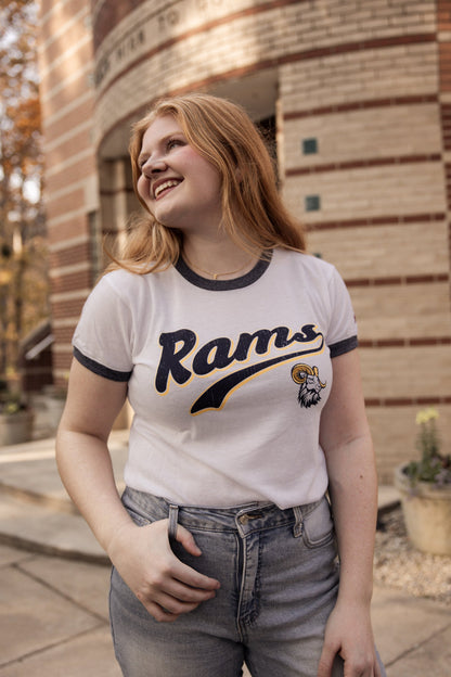 Woman smiling and wearing a &